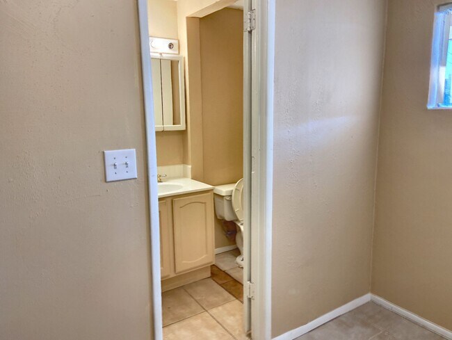 Building Photo - Move-In Ready & Modern: Fully Remodeled 4BD with Massive Yard