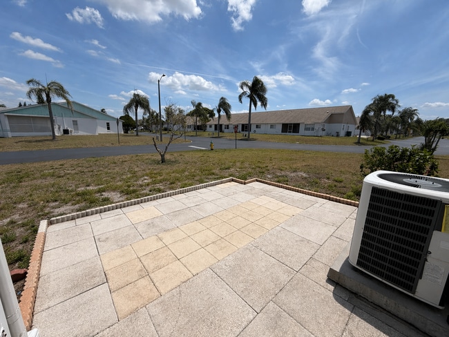 Building Photo - "Charming 2-Bed, 2-Bath Villa Retreat in New Port Richey!"