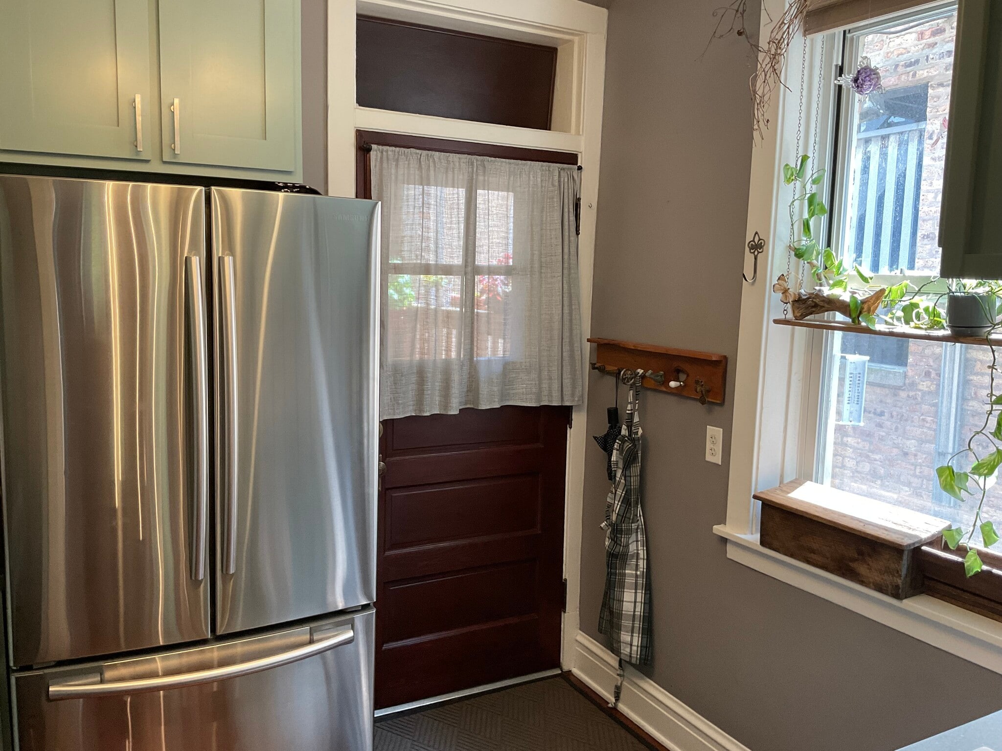 The back entrance is in the kitchen - 825 Forest Ave
