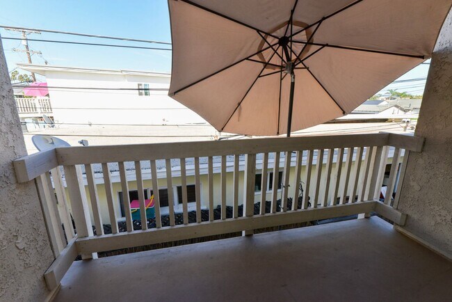 Building Photo - Sunny 2BR/2BA Coastal Retreat — Steps from the Sand with Ocean Breezes