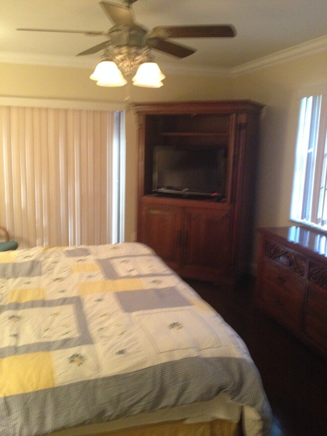 master bedroom with flat screen TV - 135 Deer Creek Blvd