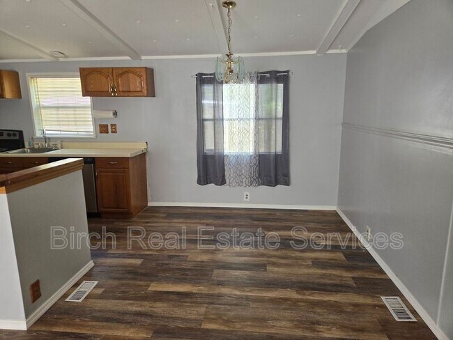 Building Photo - 8628 Adonis Rd