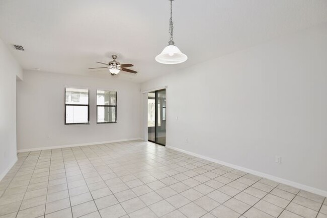 Building Photo - Stylish 4/3 Home with Covered Patio & Gara...