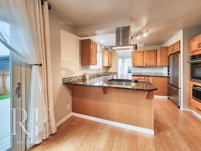 Building Photo - Modern Elegance Meets Tranquil Lakeside Living On Osprey Circle