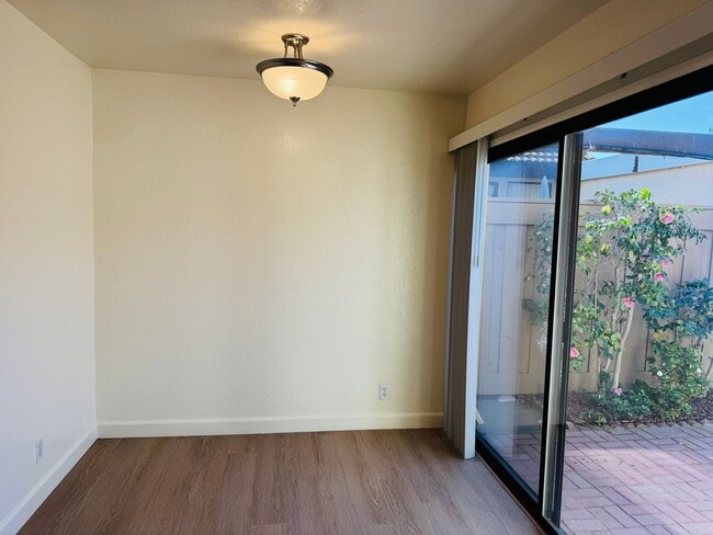 Building Photo - Tastefully updated 2 bedroom/2 bath, single level townhome w/attached 2 car garage!