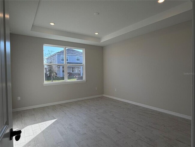 Building Photo - 5648 Flame Vine Wy