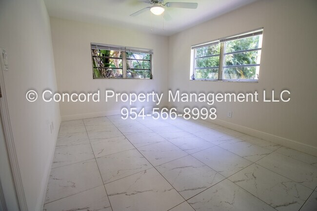 Building Photo - Holiday Special-Updated 2 BR- Open Layout- Island Kitchen-Pool- Central AC