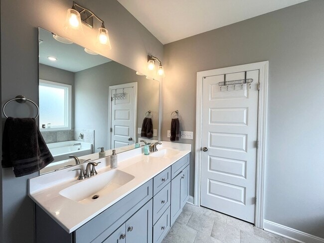 Building Photo - Private 4BR, 2.5BA Home with Modern Finishes, Back Deck and Large Yard, on a Nearly Half Acre Lot