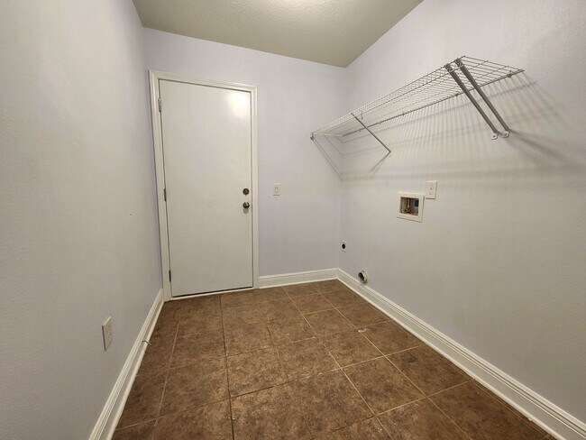 Building Photo - Welcome to your 4/2 dream home in Pace Mil...
