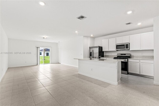Building Photo - 10722 NW Moon Rise Ln