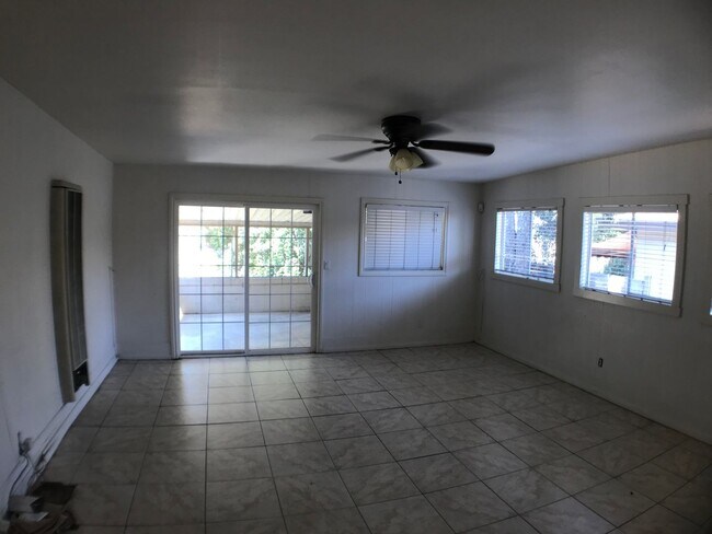 Building Photo - BEAUTIFUL WOOD FLOORS IN THIS- 5 BED 2 BATHROOM- Includes maid service