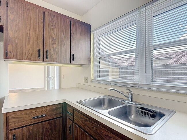 Building Photo - Spanish-Style 3 Bedroom, 2.5 Bath Mediterranean Rooftop Townhouse – Basic Cable & Wi-Fi Included!