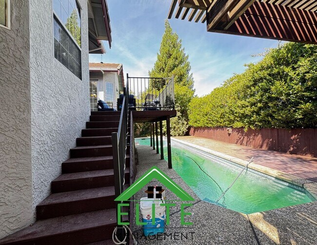 Building Photo - **Stunning Custom Home with Solar and Pool...