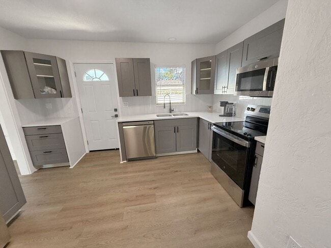 Building Photo - Recently Updated 3/2 with Pool and 2 Car Garage