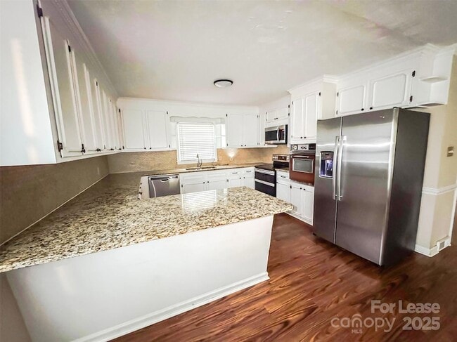 Building Photo - 9454 Flowes Store Rd