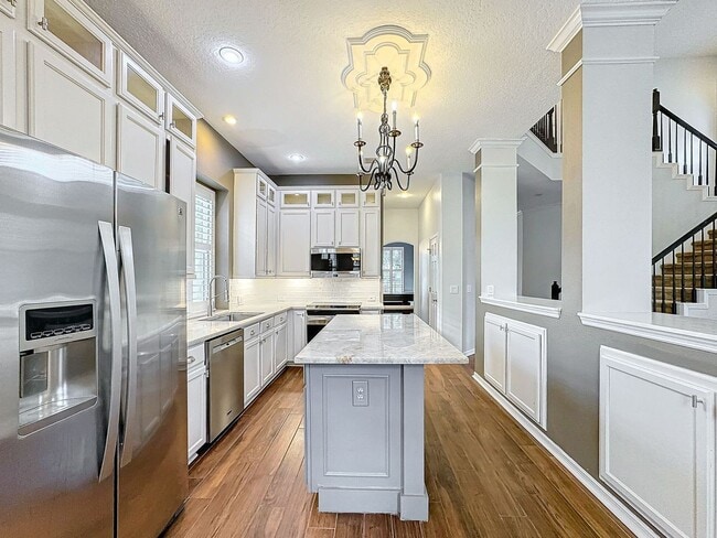 Building Photo - Stunning 5-Bedroom Home in North Village o...