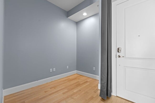 Building Photo - Modern 1-Bedroom with Downtown Raleigh Skyline Views