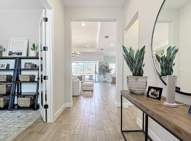 Building Photo - Luxury Lakeview Oasis with Pool & Spa – Br...