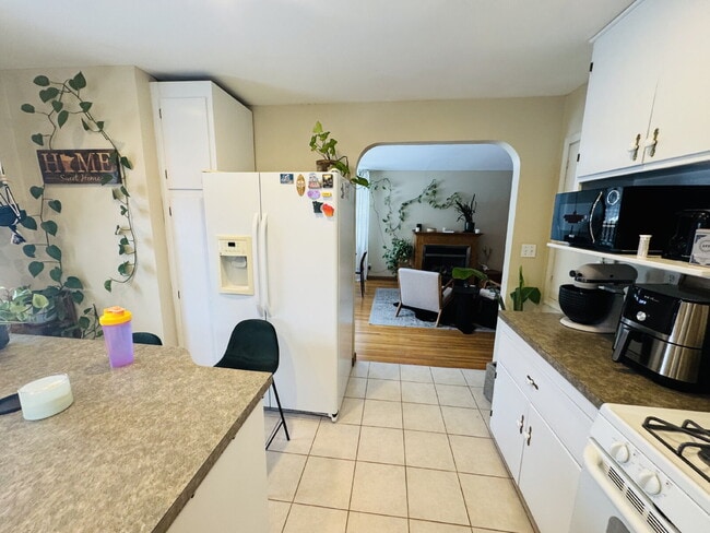 Building Photo - Spacious 5-Bed Home with Finished Basement & Gleaming Hardwood Floors in St. Louis Park!