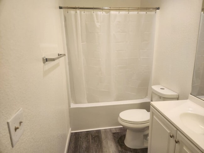 Building Photo - A Must See! Nice and bright, lots of light, two story condo in a well maintained complex.