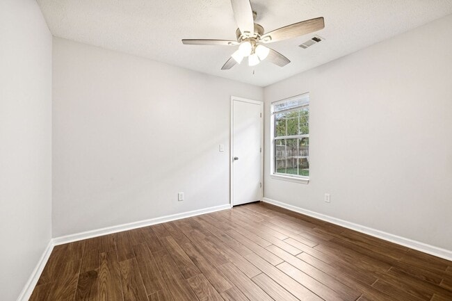 Building Photo - Welcome to this beautifully remodeled sing...