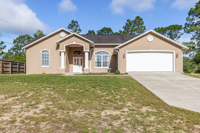 Building Photo - Spacious 4-Bedroom Home on a Peaceful Homesite in Dunnellon