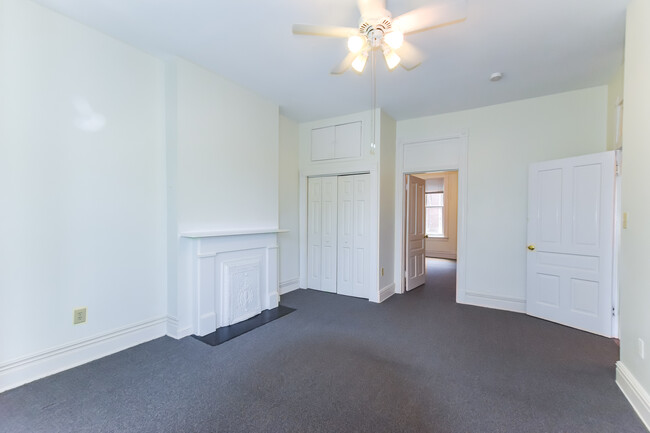 Large double closets in all bedrooms and ceiling fans. - 1617 W Grace St