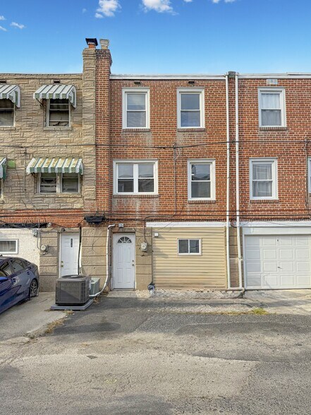 Back of Home with two parking spots - 116 W Berkley Ave