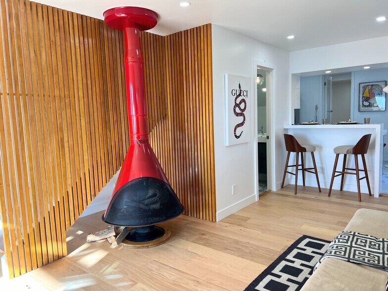 Retro fireplace with electric log heater insert - 2233 Manchester Ave