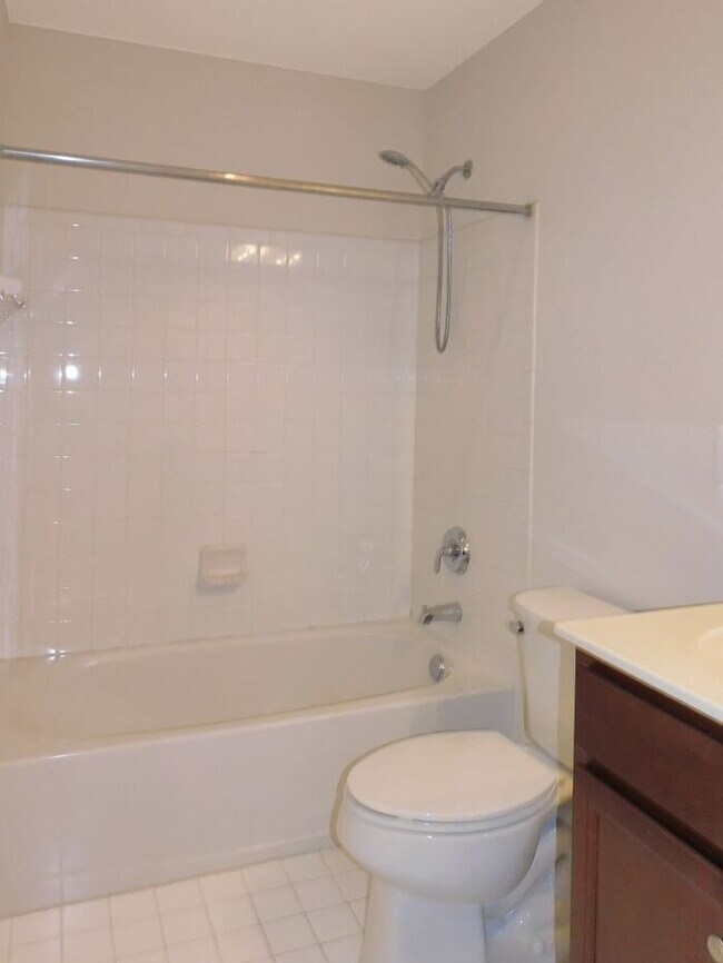 Building Photo - Pet Friendly 3 level End Unit Town Home wi...
