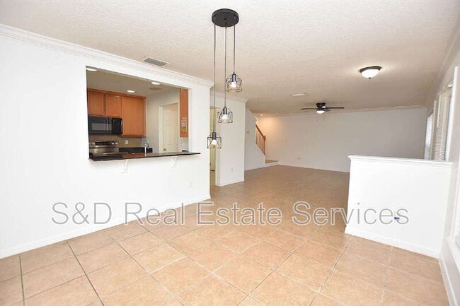 Building Photo - 5365 River Rock Rd