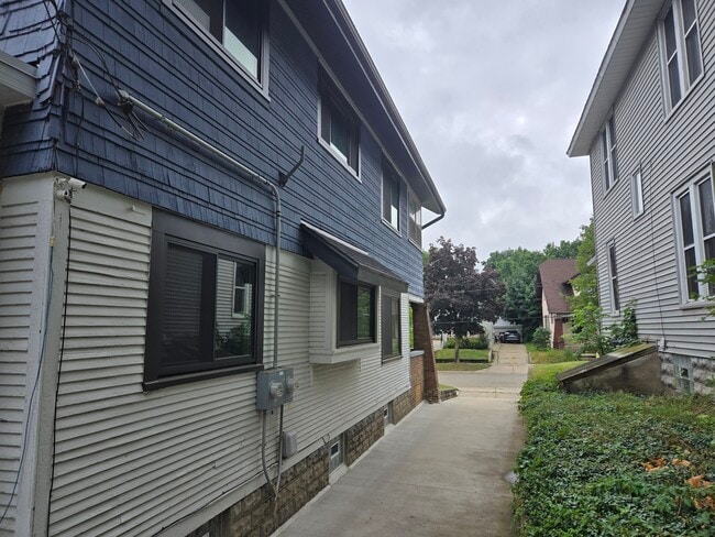 driveway view, large windows - 1019 Widdicomb Ave NW