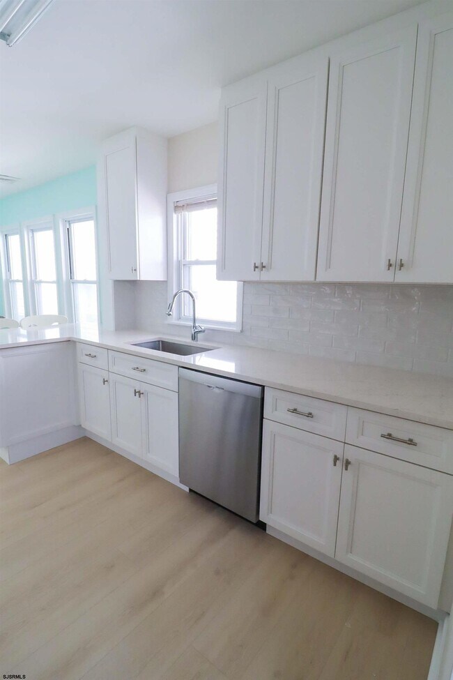 Building Photo - 129 N Derby Ave