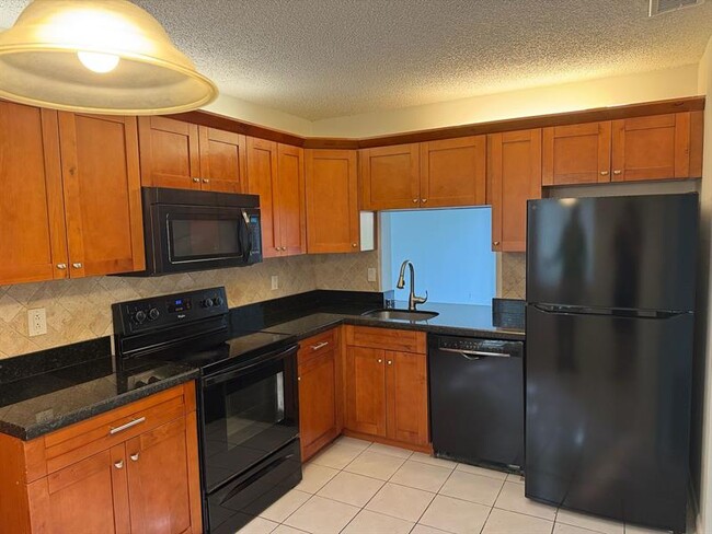 Building Photo - 3733 Carambola Cir N