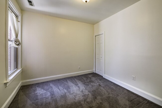 Building Photo - Historic & Charming 3BR Rowhouse near Howard is Move-in Ready!