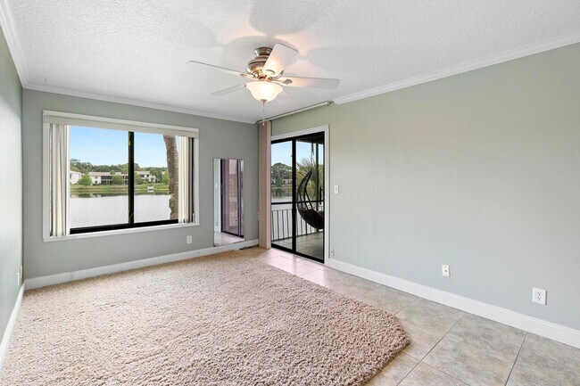 Building Photo - Lakefront lifestyle in this stunning 3-bed...