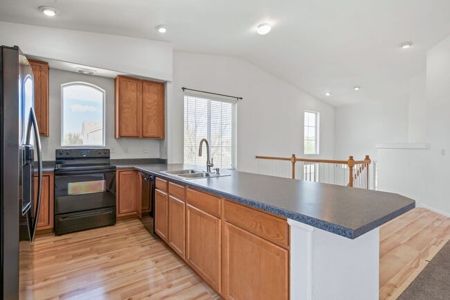 Building Photo - Bright & Spacious 4BR Tri-Level Home w/ Backyard + 2-Car Garage | Pool Access Included!