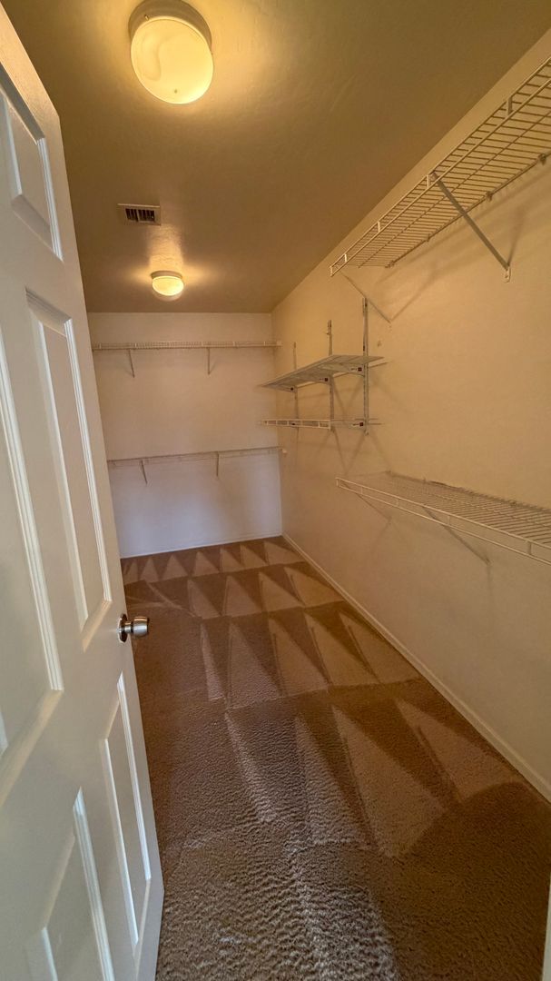 Building Photo - Two Story Home with NEW tile and a large backyard!