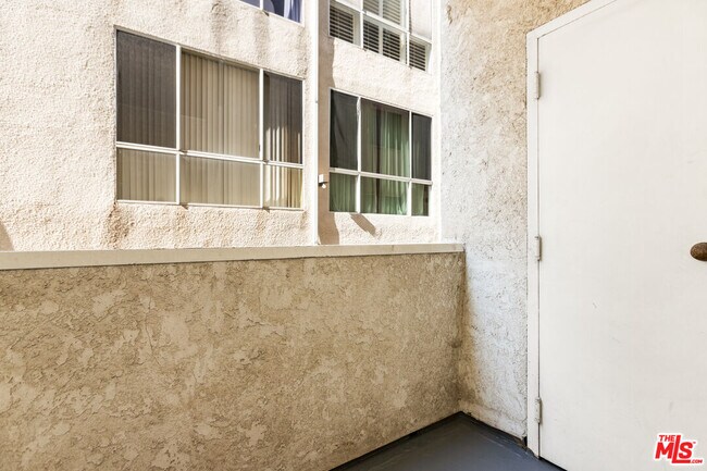 Building Photo - 10630 Wilkins Ave