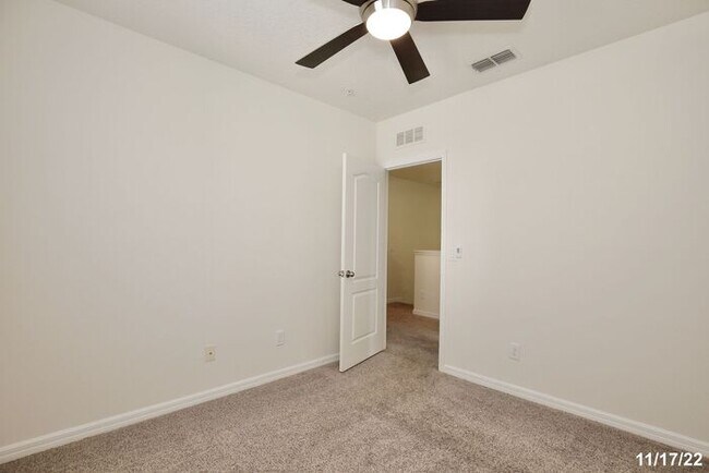 Building Photo - Spacious 3/2.5 Townhome with a 2 Car Garage and a Beautiful Pond View in Westwood Condos - Orlando!