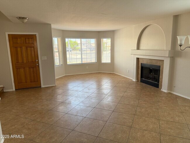 Building Photo - 8460 W Aster Dr