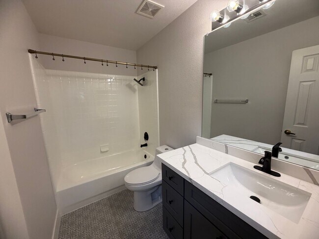 Building Photo - BEAUTIFULLY UPGRADED SINGLE FAMILY HOME - 3 BEDROOM, CORNER LOT WITH VAULTED CEILINGS