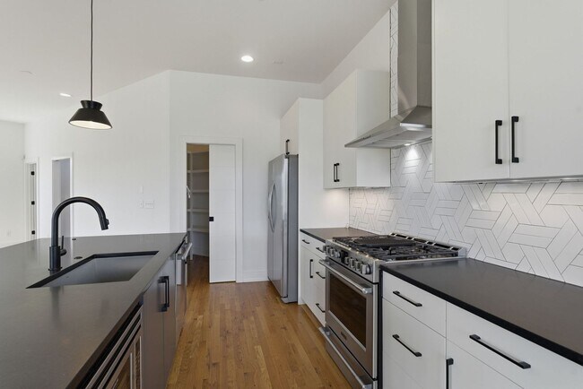 Building Photo - Beautiful 3-BR Property with Rooftop Deck!