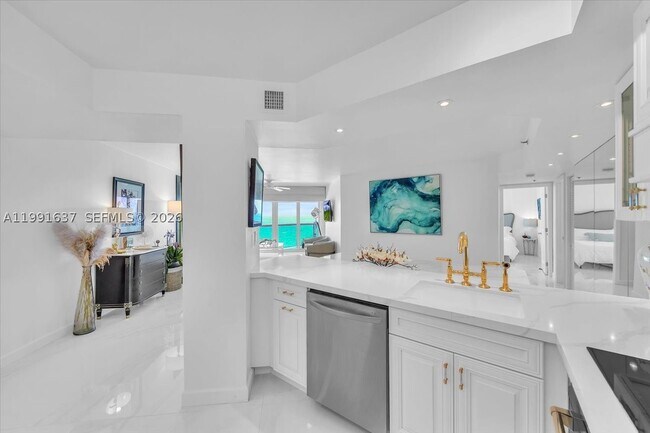 Building Photo - 6767 Collins Ave