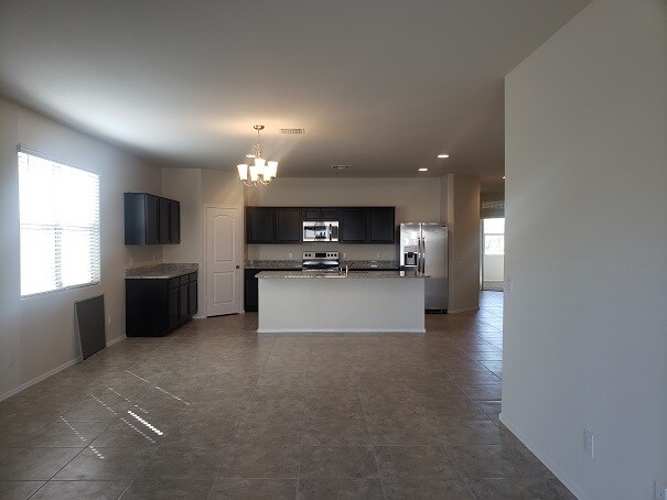 Building Photo - 37698 W Capri Ave