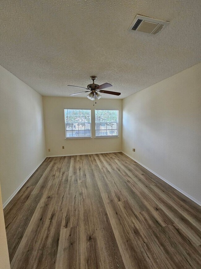 Building Photo - Beautifully Updated 2BR/2BA with Loft Oasis – Safe & Gated Community