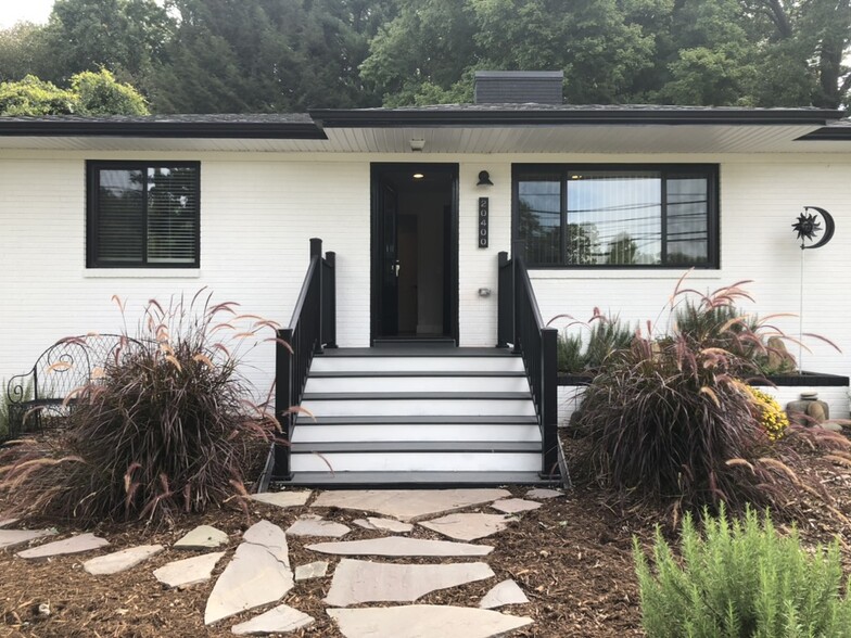 Wide front porch of updated house - 20400 Church St