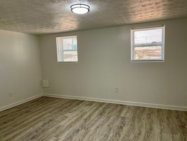 Building Photo - Updated 4 Bedroom Home with NO Carpet!