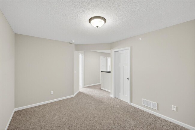 Building Photo - New construction interior-unit townhome in...