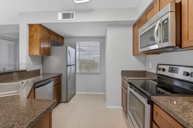 Building Photo - 9999 Summerbreeze Dr